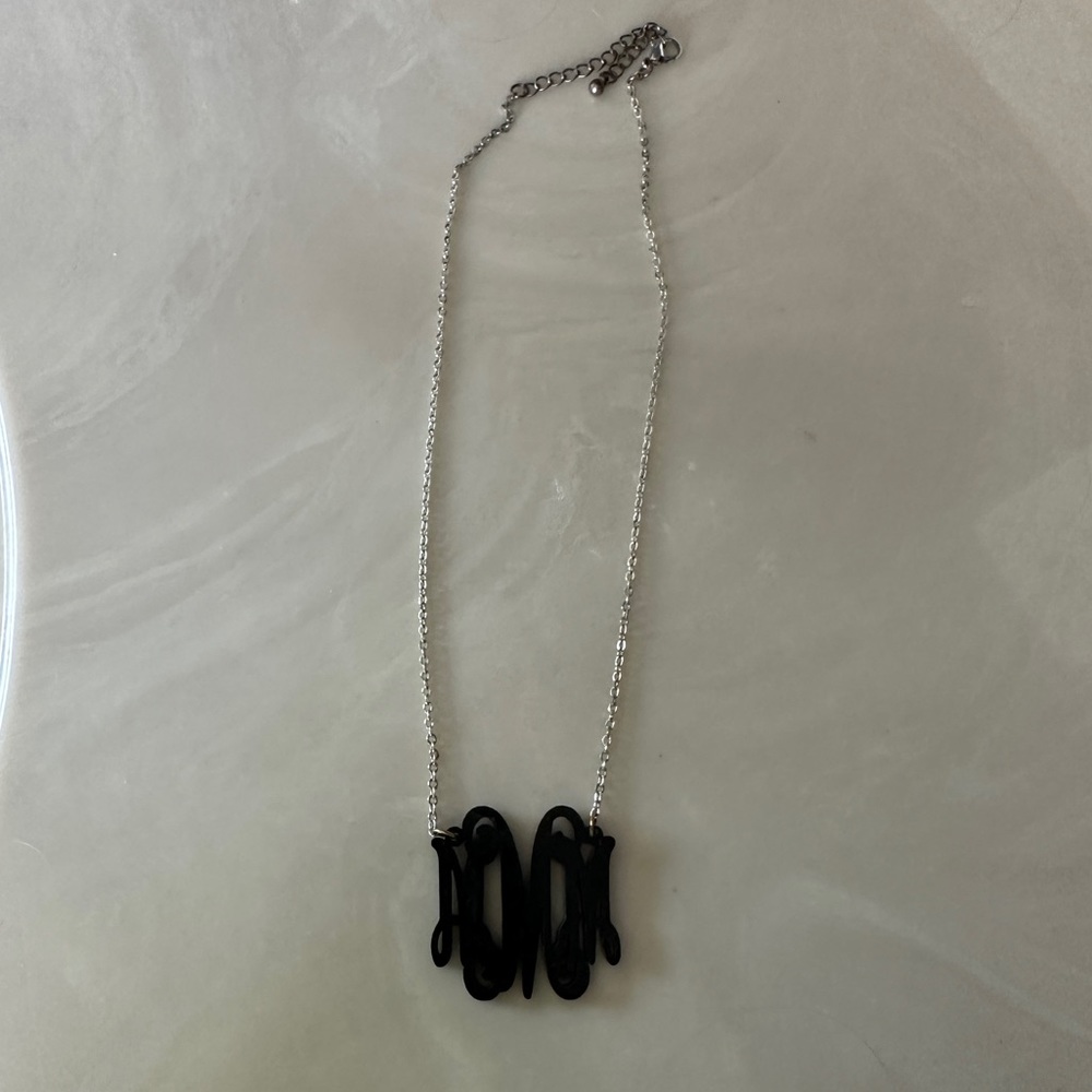 Black acrylic MMM monogram necklace